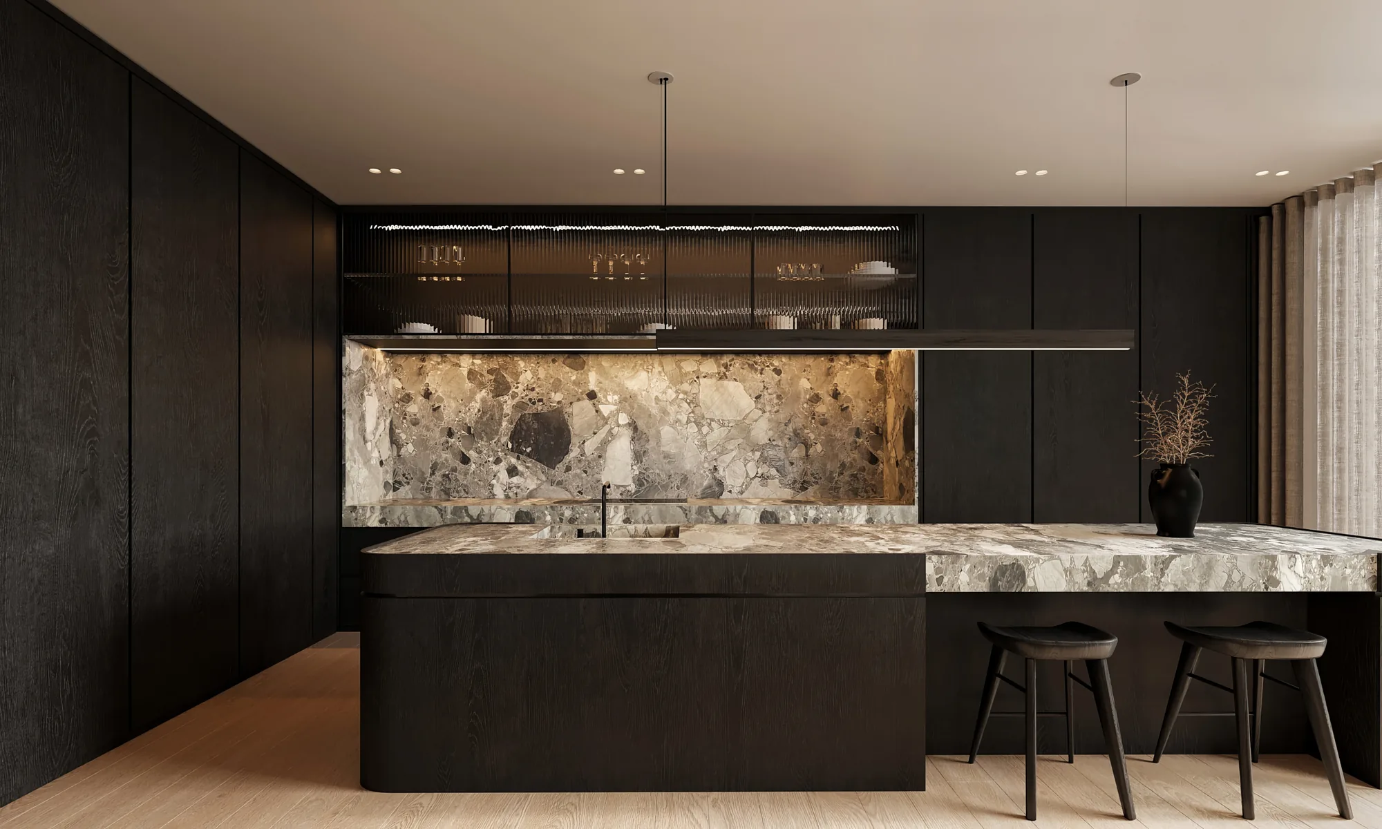 Dark kitchen with dramatic natural stone counters and backsplash